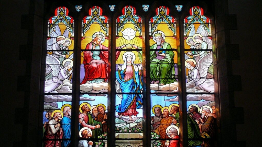 Stained glass window of Holy Trinity and Mary being crowned
